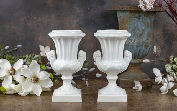 Pair of White Footed Urns – £155