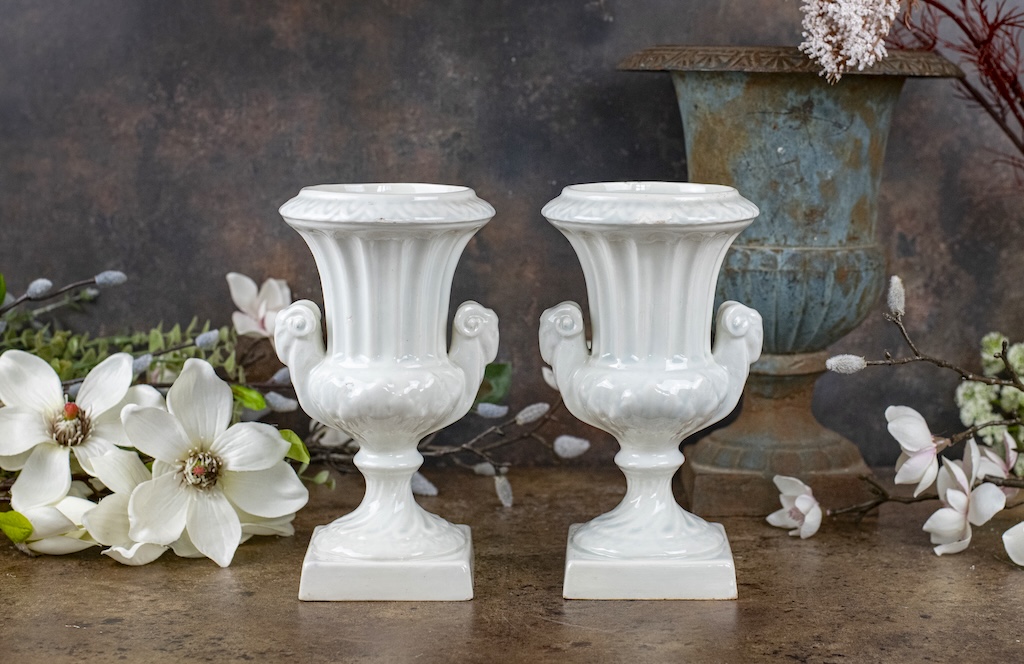Pair of White Footed Urns – £155